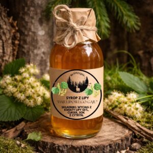 syrop z kwiatu lipy 330 ml w szklanej butelce w naturalnej, leśnej aranżacji
