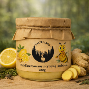 miód kremowany z cytryną i imbirem w słoiku na drewnianym tle